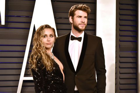 Liam Hemsworth and Miley Cyrus.